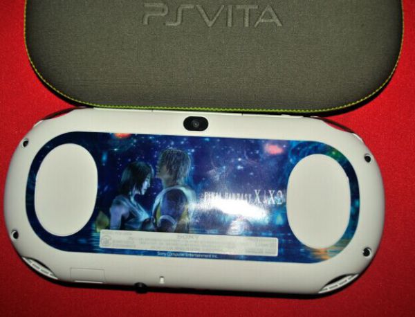 出个成色全新的最终幻想10的限定版PSV主机
